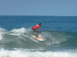 Improve your technique or learn how to surf at Cocles beach, minutes from Geckoes Lodge
